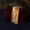 ANTIQUE FINISH SEMI RUBY STONE FITTED BANGLE WITH WHITE BEEDS AND MINAKARI WORK DONE