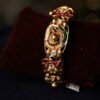 ANTIQUE FINISH SEMI WHITE STONE FITTED BANGLE WITH WHITE & GREEN BEEDS AND MINAKARI WORK DONE