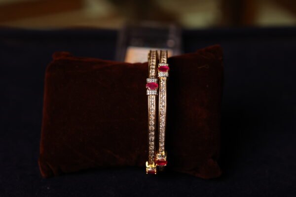 GOLD PLATTED WHITE & RUBY STONE FITTED BANGLES